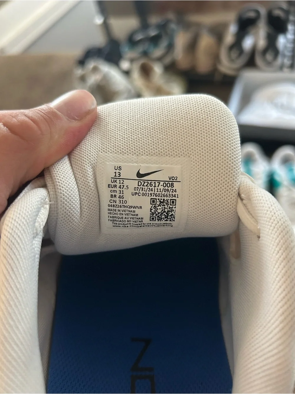 Nike Men’s White and Blue Cross-Training Sneakers